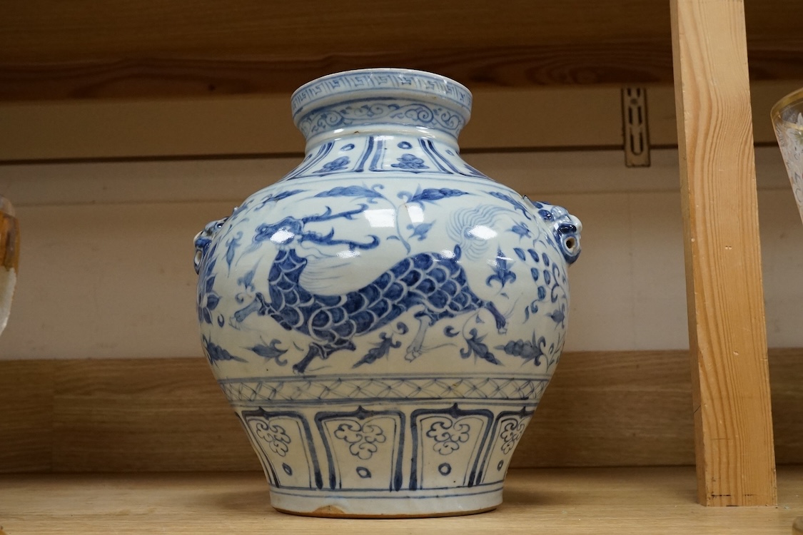 A Chinese blue and white bulbous jar hand painted with animals, 28cm high